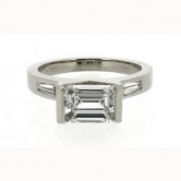 18ct white gold ring set with an emerald cut diamond