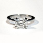 Platinum ring set with a modified emerald cut diamond