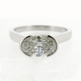 18ct white gold set with an oval cut diamond
