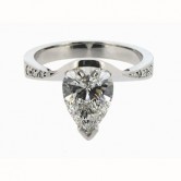 Platinum ring set with a pear cut diamond