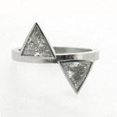 Platinum ring set with triliian cut diamonds