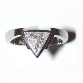 Platinum ring set with a bow sided trillian cut diamond