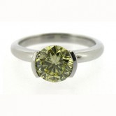 Platinum ring set with a natural fancy yellow diamond