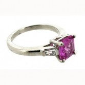 18ct white gold ring set with a fine pink sapphire and baguette diamonds